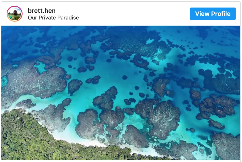 Isla Zapatilla drone shot with blue water and coral reef from brett henninger for the bocas del toro blog.