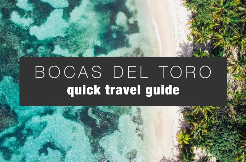 Cover image for the quick travel guide to Bocas del Toro featuring Polo Beach drone shot with blue water and palm tree lined beach.