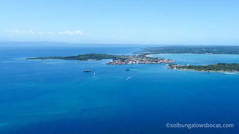 Blue sky and clear blue water over Isla Colon in Bocas del Toro Panama