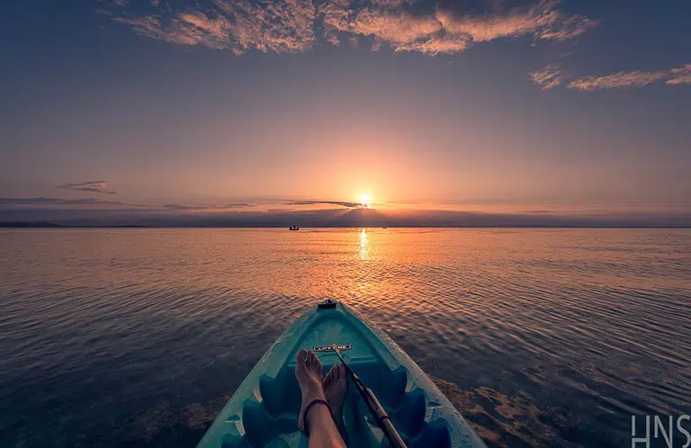 sunset kayaking in bocas del toro at saigon bay.