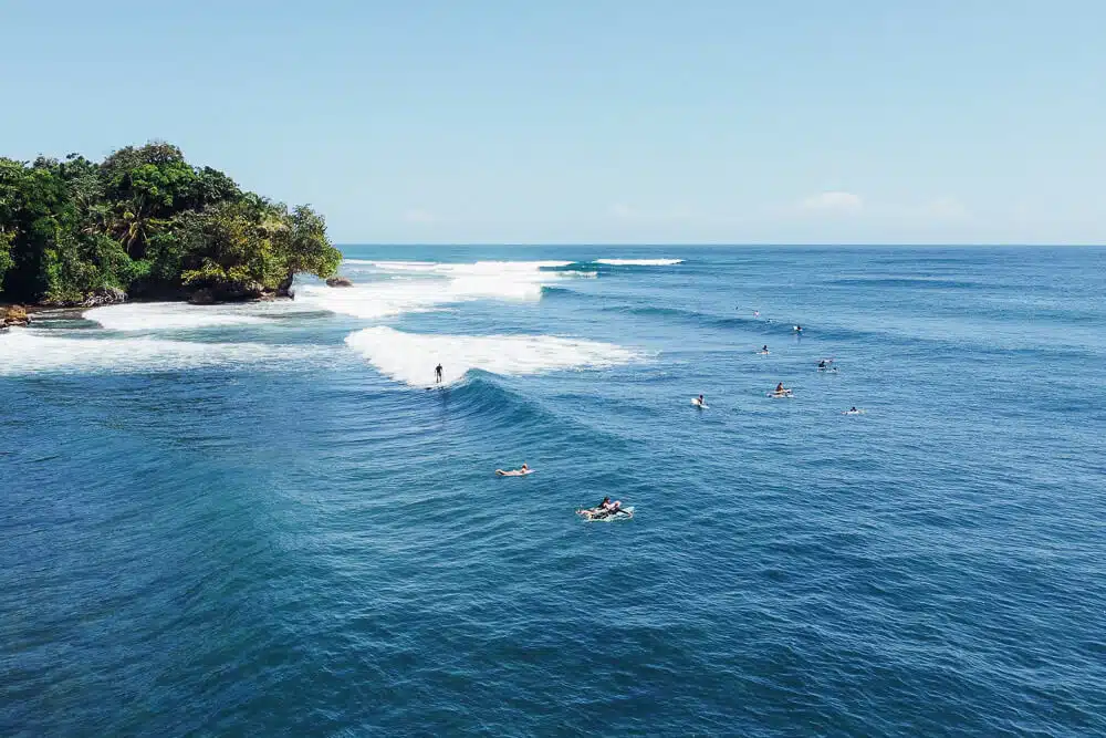 surfing on isla carenero in bocas del toro panama