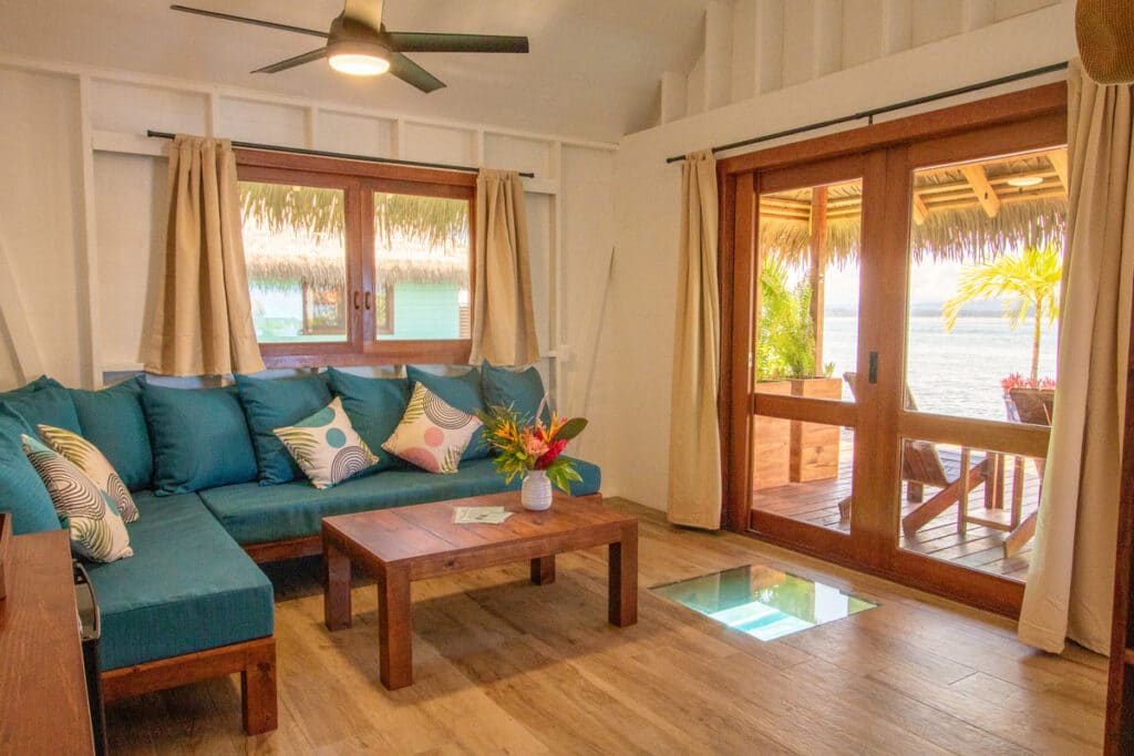 Relax on the custom made sofa with Sunbrella materials while you gaze at marine life through the glass floors and watch the sunset through the handmade sliding doors.